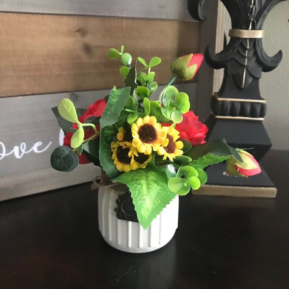 White Jar w/Faux Sunflowers, Red Flowers, Greenery, & Bronze Clock Charm